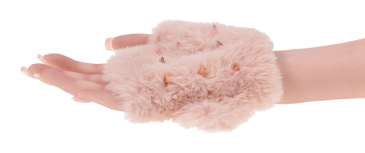 A pink faux fur glove with rose gold spikes on a hand.