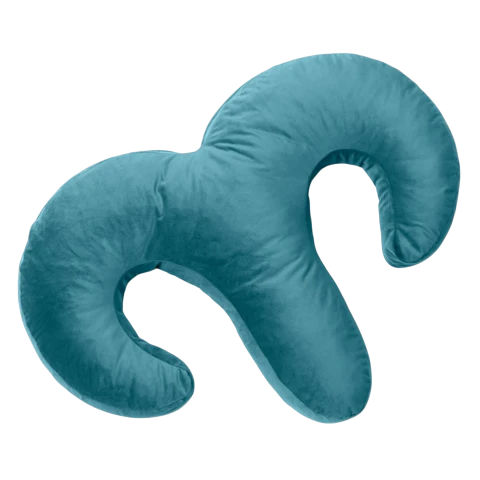 A blue memory foam pillow with a curved shape.