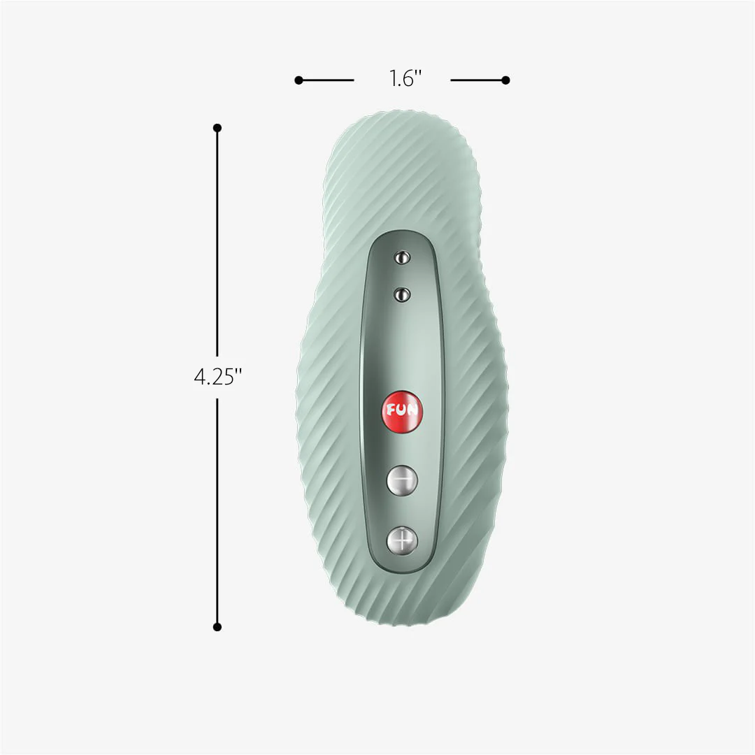 A light green external massager with a textured surface and three buttons.