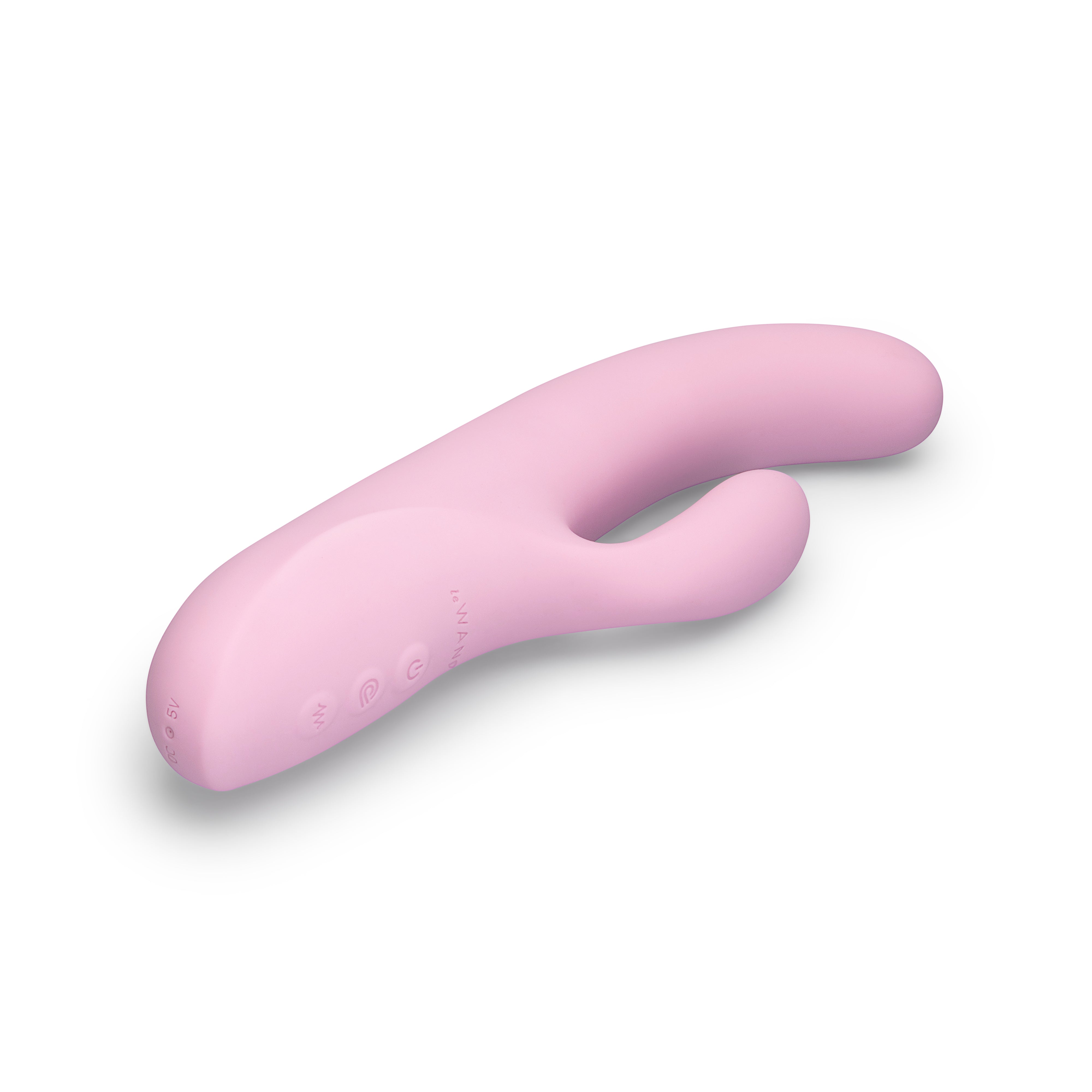A pink silicone rabbit vibrator with buttons and text indicating "DC 5V" and "Le Wand".