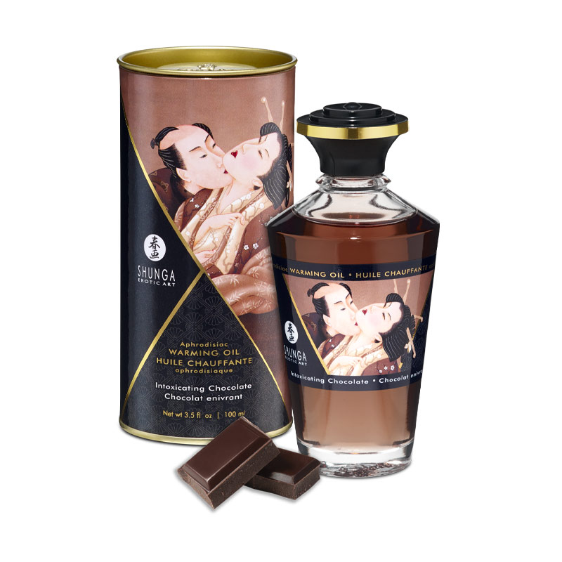Shunga Intoxicating Chocolate warming oil in a bottle and tube with Japanese art.