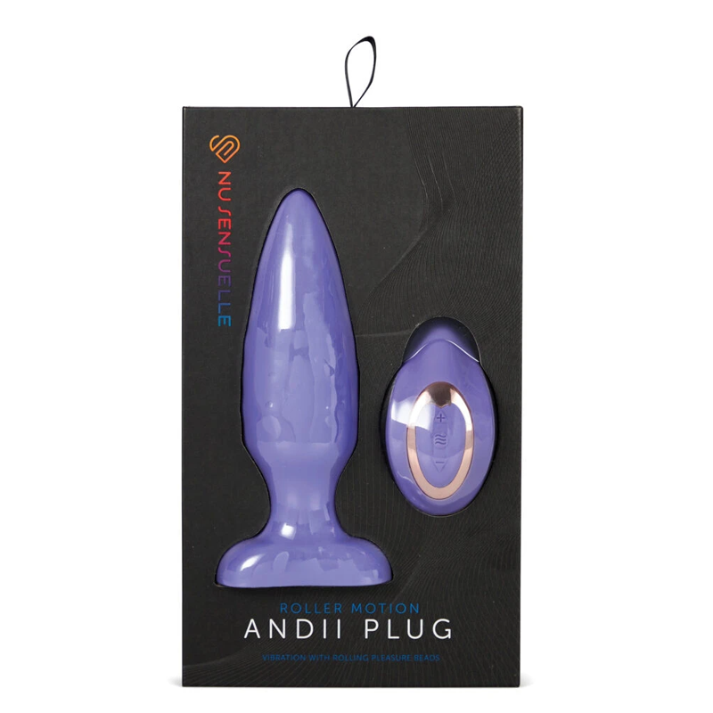 A purple anal plug and remote control in a black box.