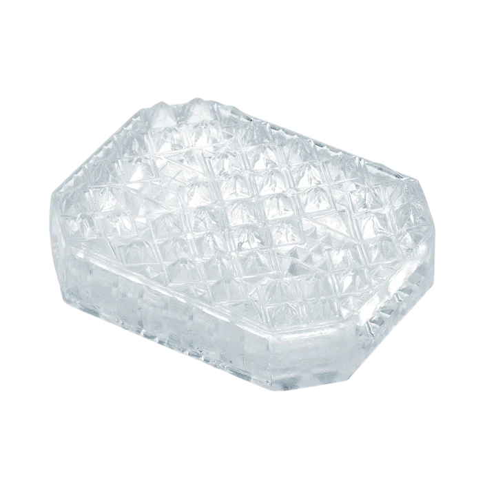 A clear, diamond-patterned sleeve with a textured surface.