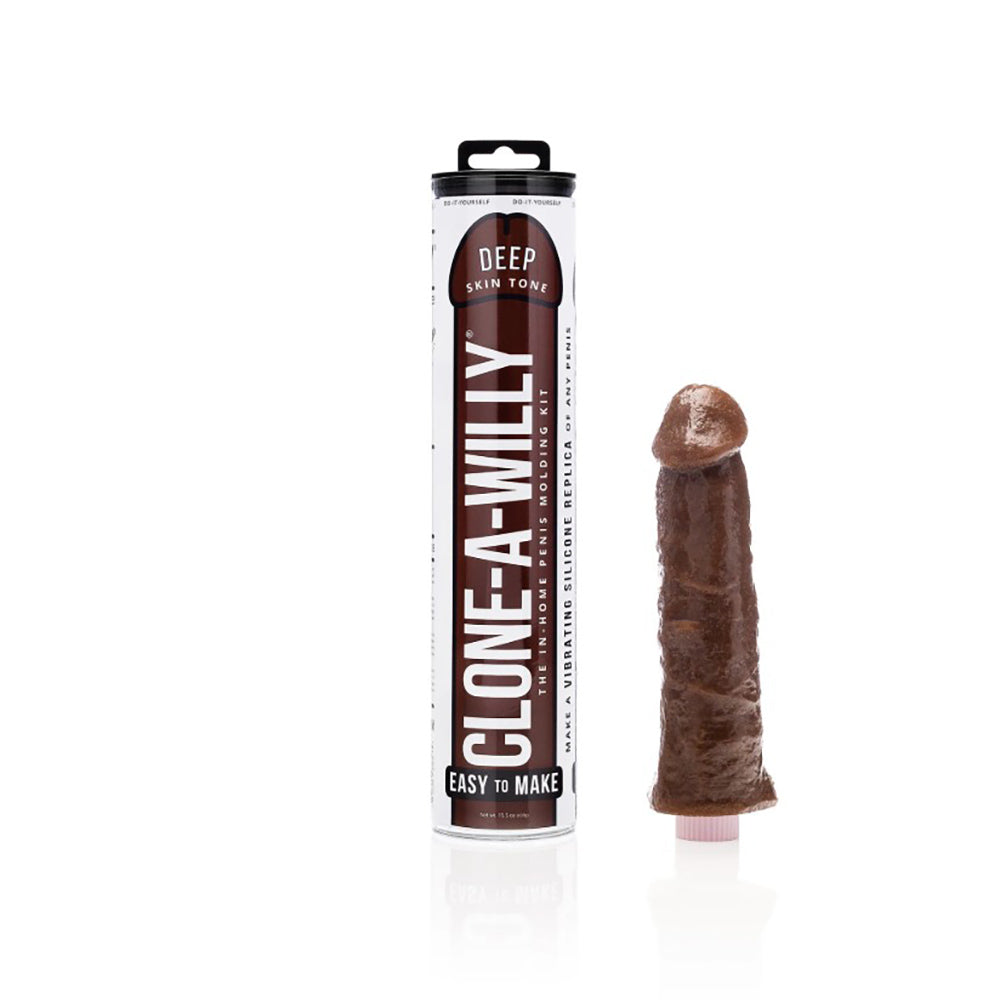 Clone-A-Willy dark skin tone silicone penis casting kit in box with molding tube and vibrator.