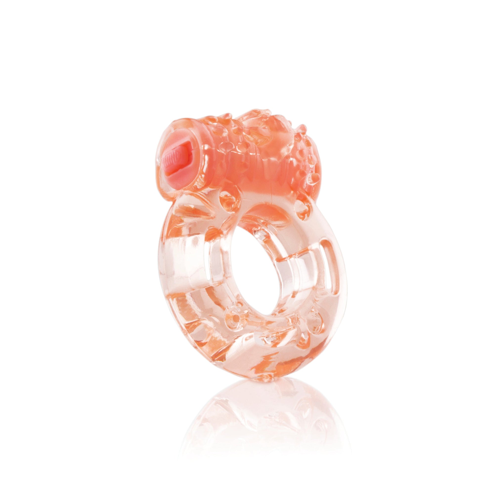 A clear, textured, vibrating cock ring with a pink insert.