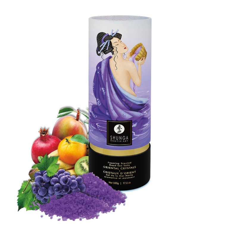Shunga Exotic Fruits Dead Sea Bath Salts in a decorative tube with fruit and bath salts.