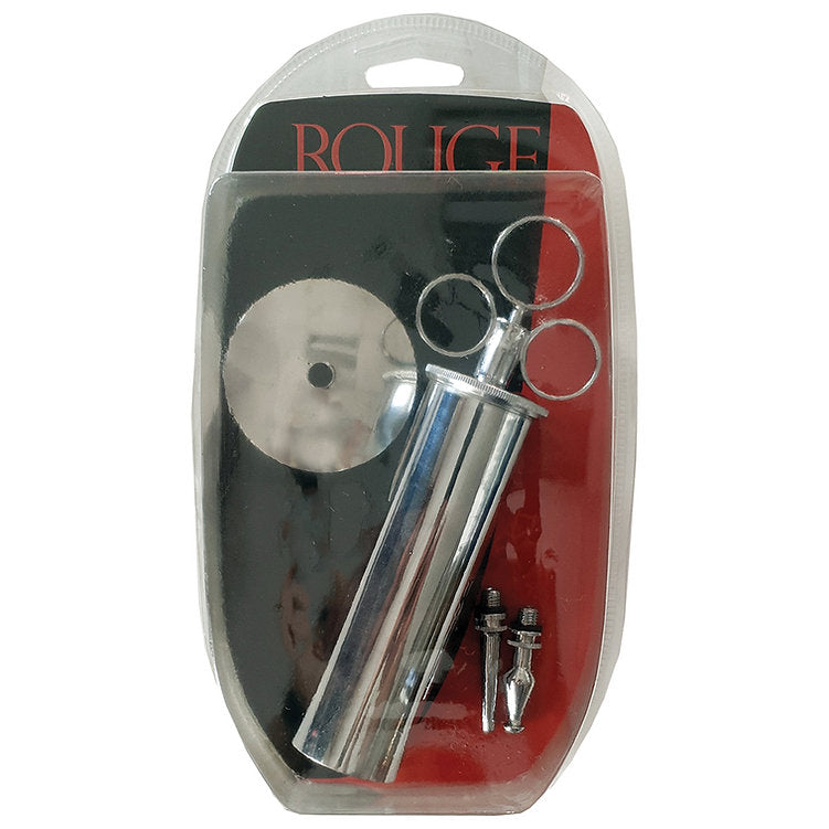 Stainless steel enema syringe with two tips in packaging.