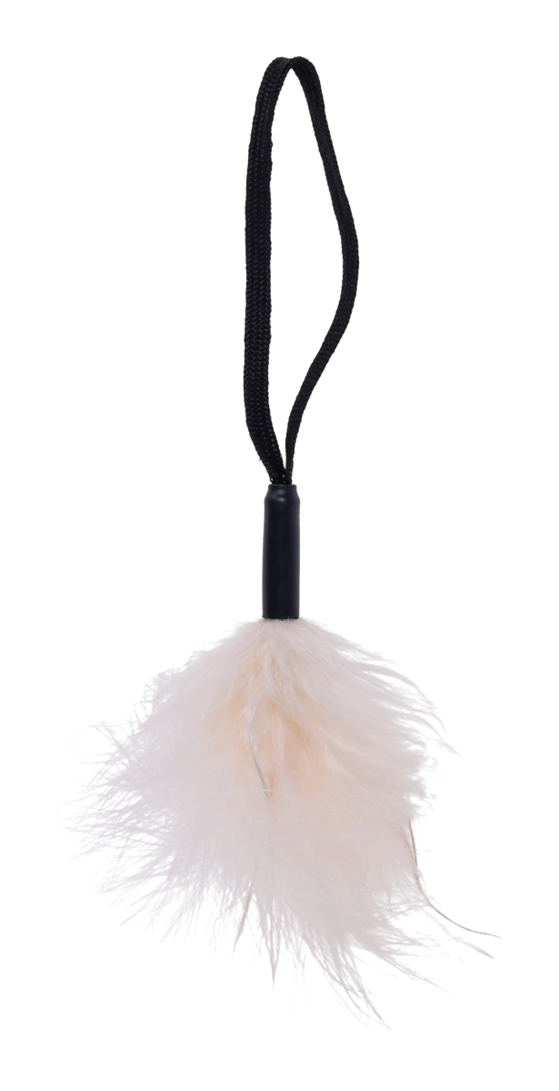 A black cord attaches a fluffy cream feather tickler to a wrist loop.