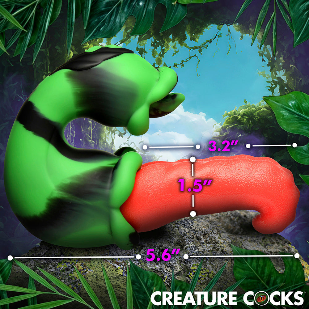 Green and black striped creature toy with a red tongue, showing dimensions 3.2, 1.5, and 5.6 inches.