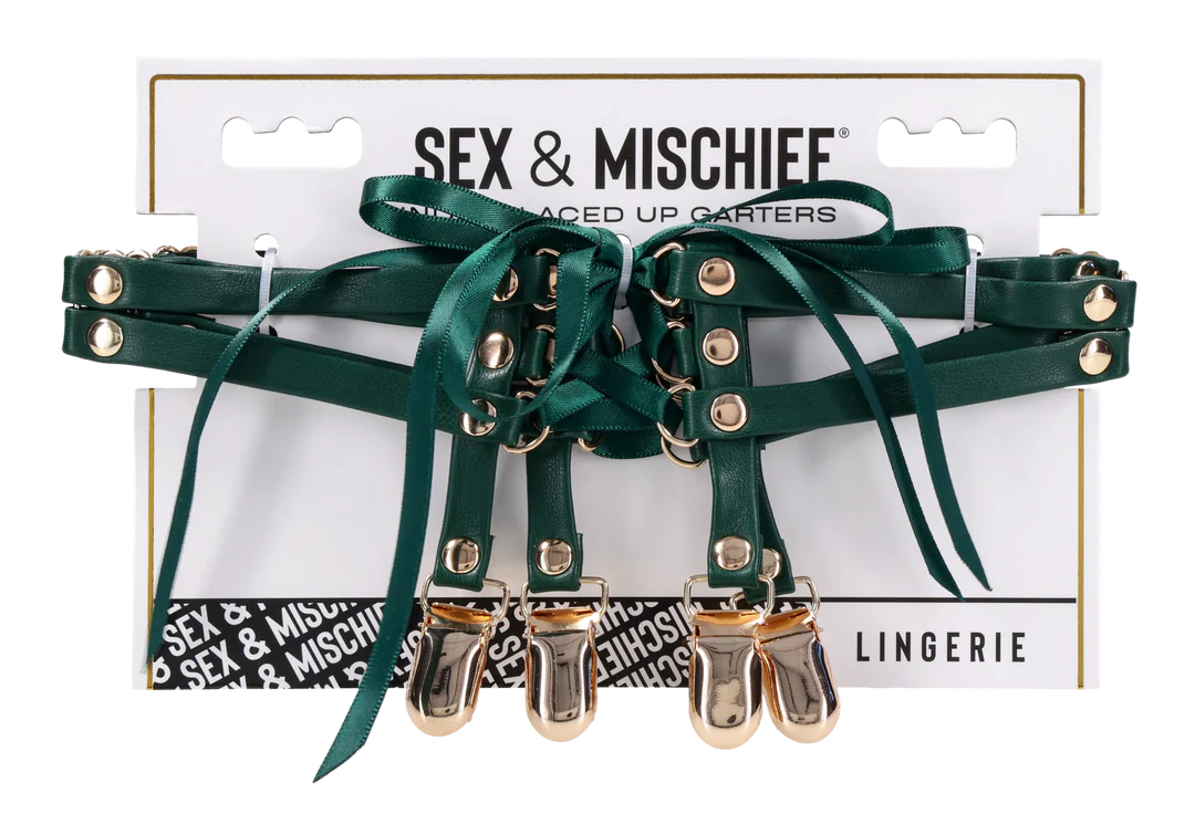 Emerald faux leather garters with gold clips and satin ribbon lacing.