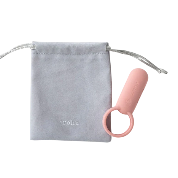 A coral pink vibrating ring with a storage pouch, both featuring the Iroha logo.