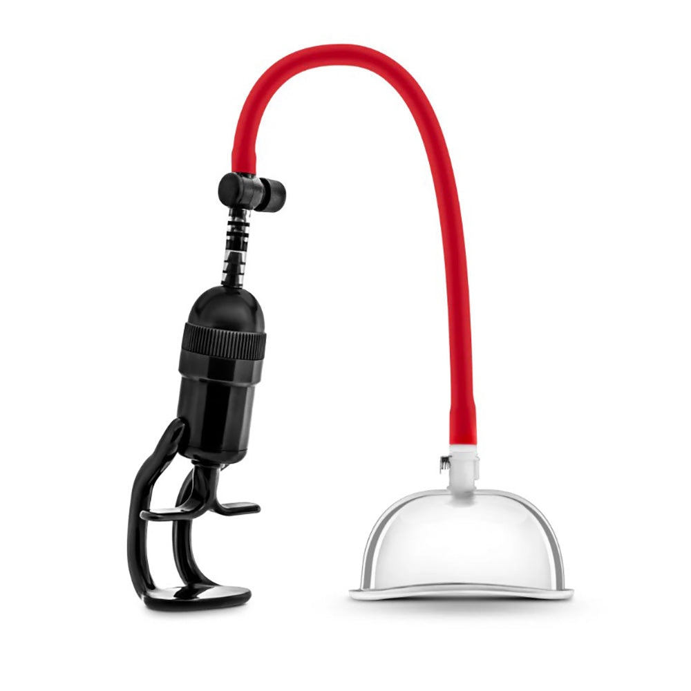 A black and red pussy pump system with a clear acrylic cup.