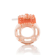 A clear vibrating cock ring with orange clitoral ticklers.