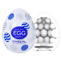 White Tenga egg masturbator with internal textured bumps and ribs.