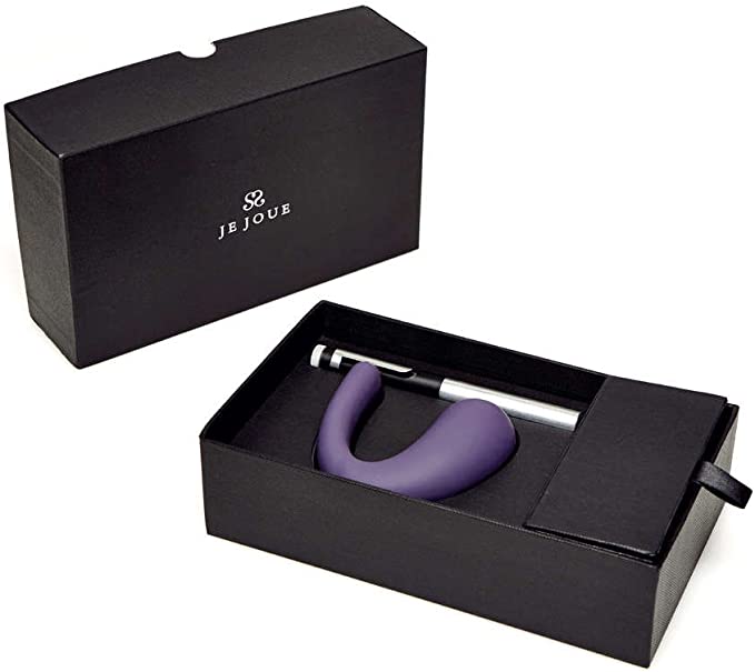 Purple G-spot massager and remote in a black box.