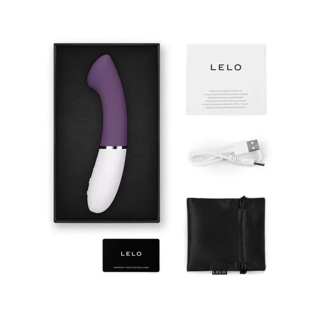 App-controlled purple and white silicone G-spot vibrator with accessories.