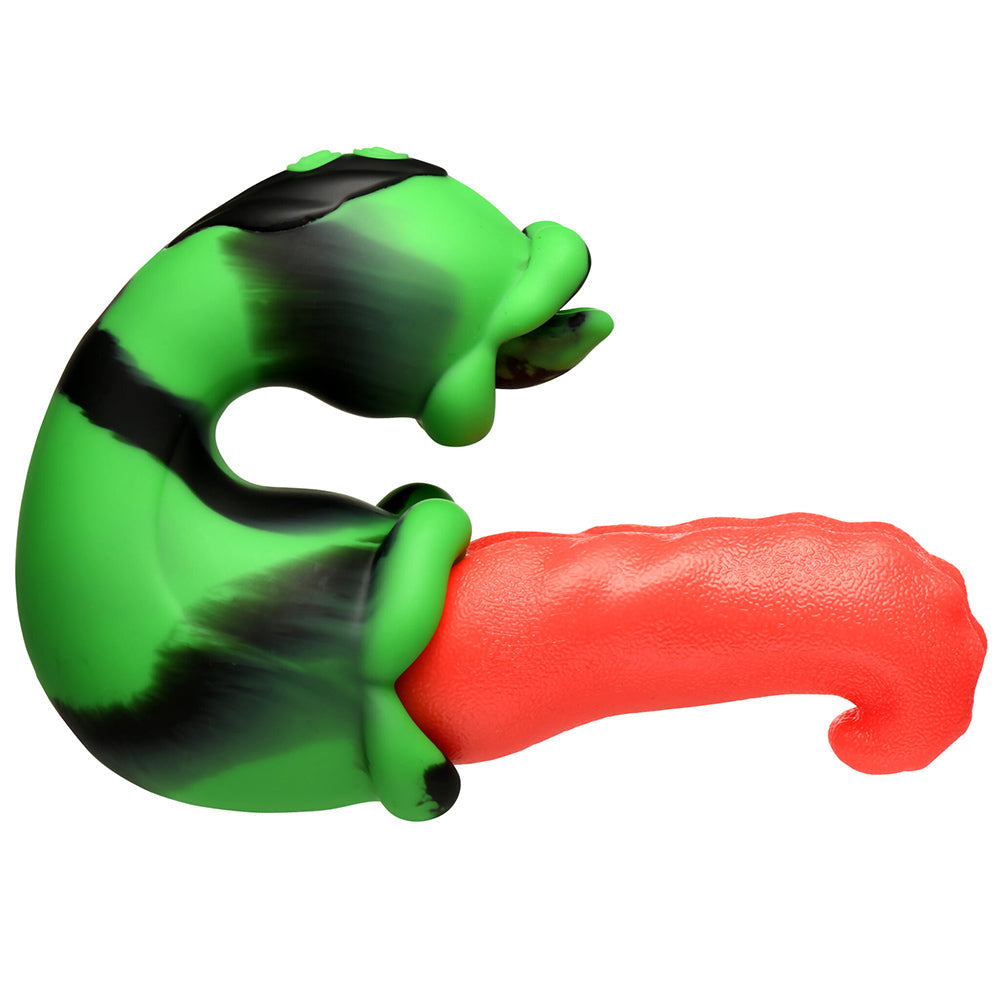 Green and black striped toy with a red textured tongue.