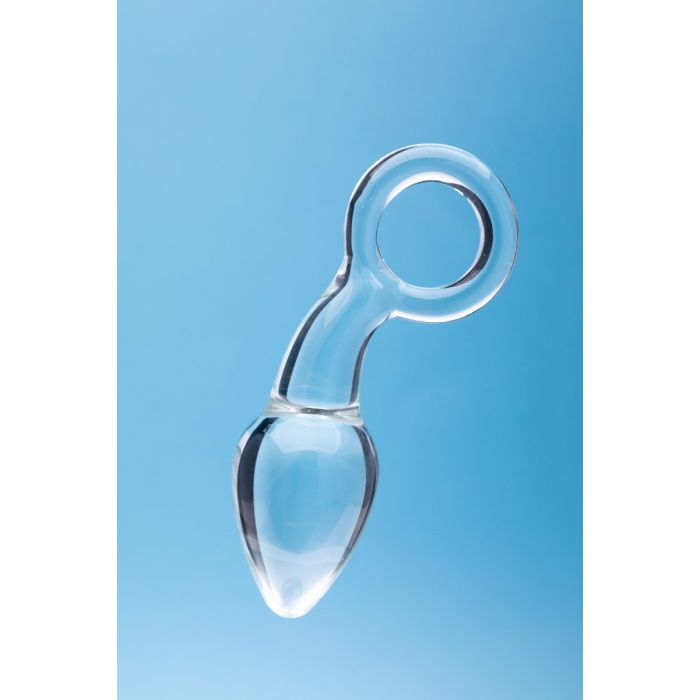 Clear glass anal plug with a tapered tip and a loop handle.