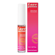 Love potion sensual lip gloss in a clear tube with a white cap and a pink box.
