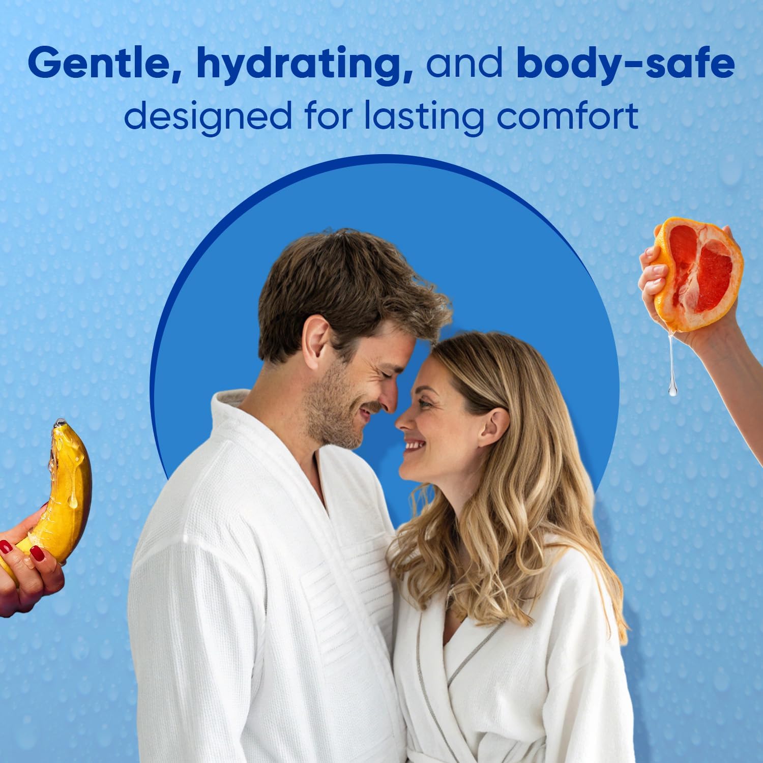 A couple in bathrobes smiles at each other, with a banana and grapefruit on either side.