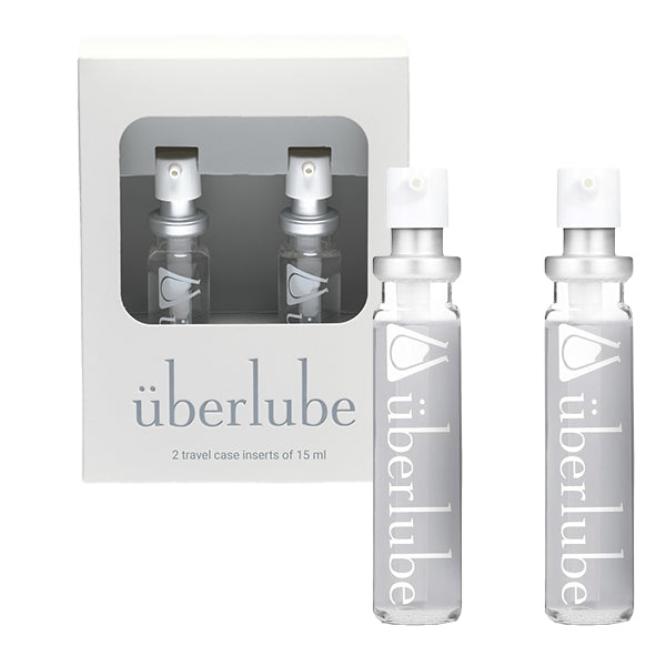 Two glass refill cartridges for Uberlube personal lubricant.