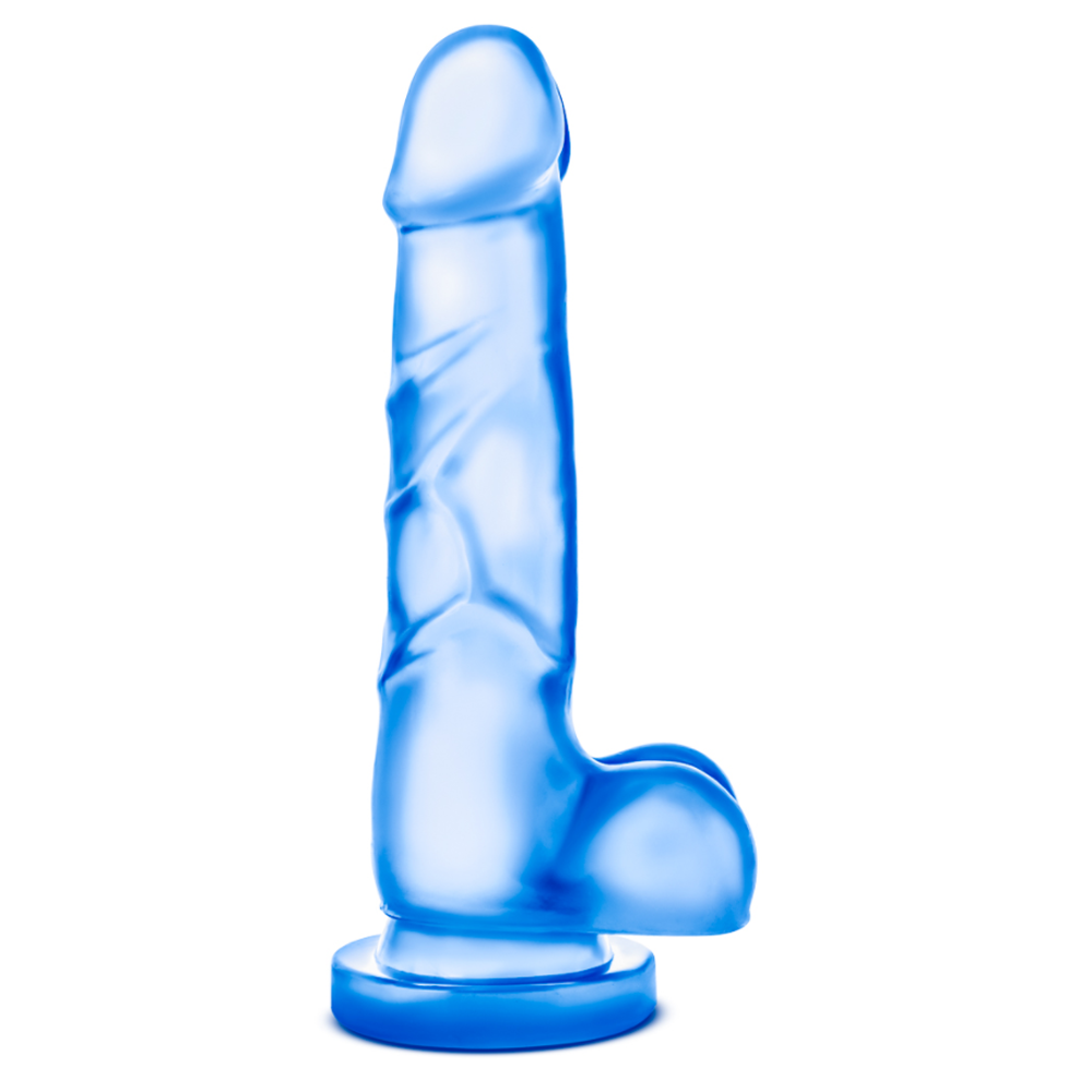 A blue realistic suction cup dildo with harness compatibility, standing upright.