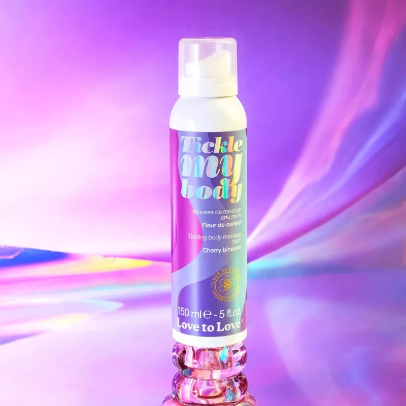 Cherry Blossom Tickling Massage Foam bottle with holographic label.