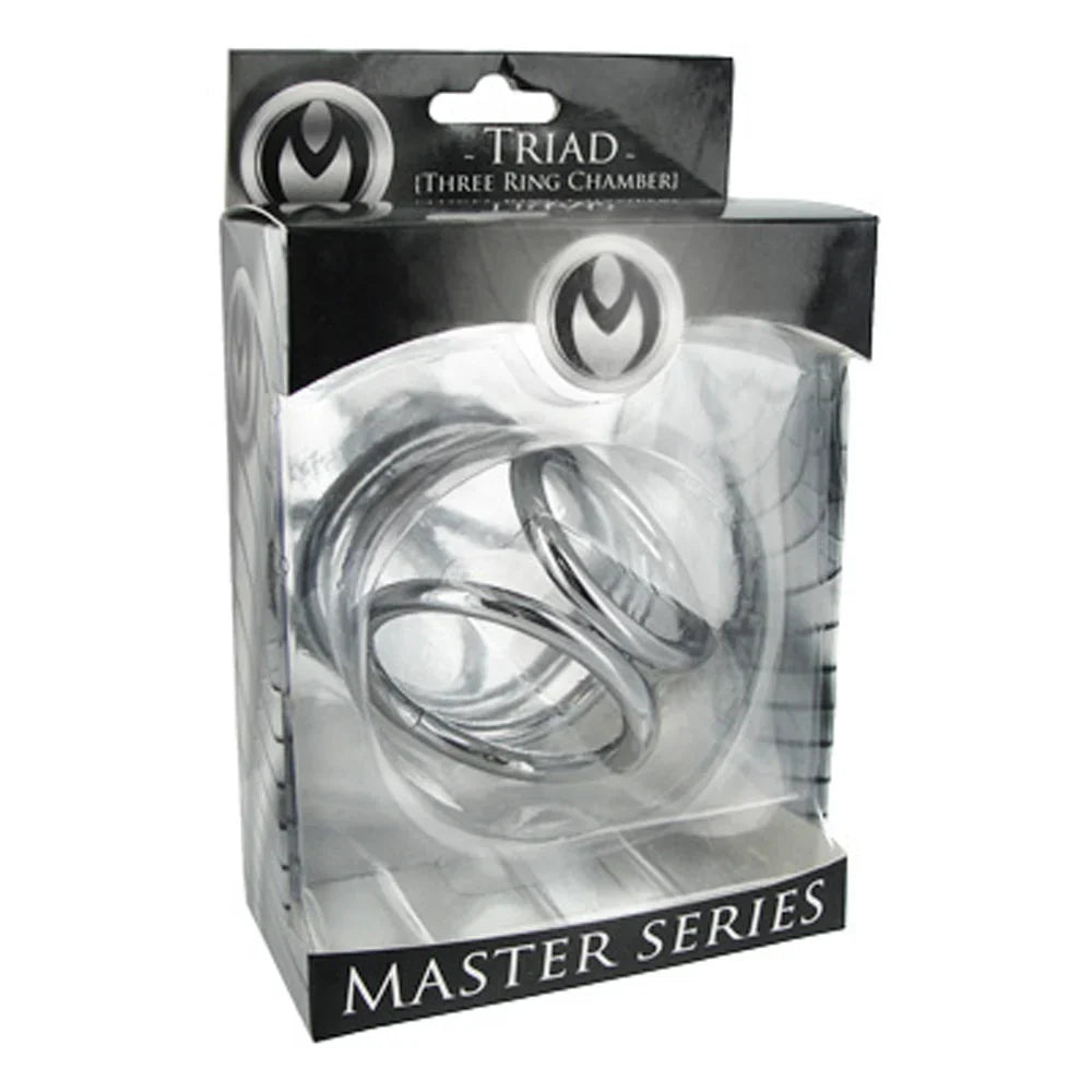 Triad Triple Cock and Ball Ring in chrome weighted cage packaging.