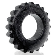 Black speckled TPR cock ring with textured outer edge.