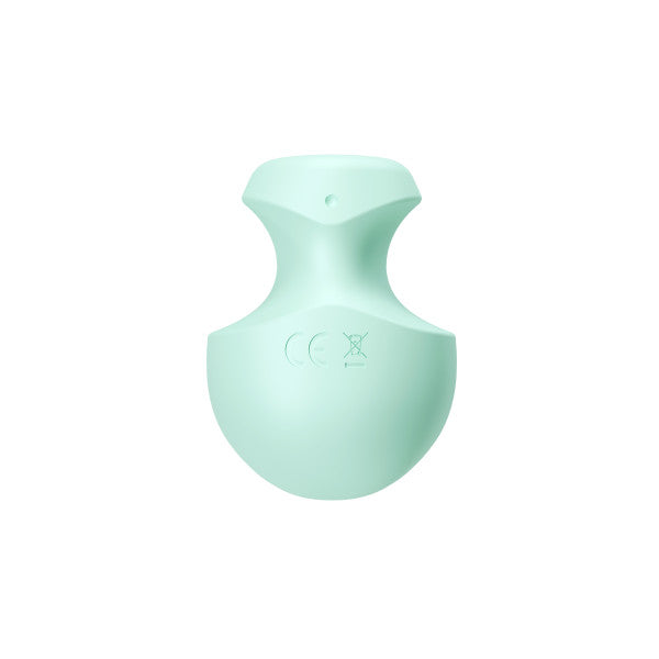A light green silicone vibrator with CE marking.