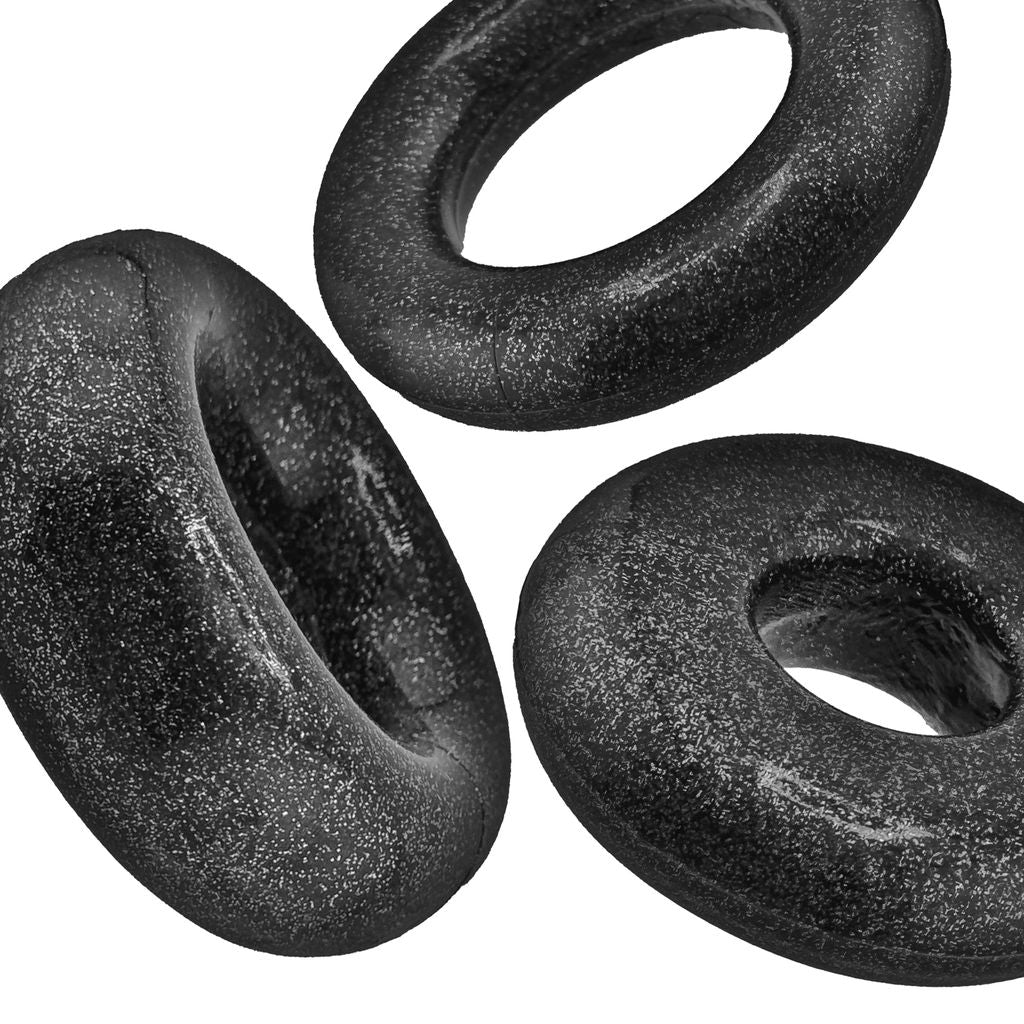 Three black mica cock rings of varying sizes.
