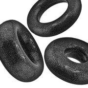 Three black mica cock rings of varying sizes.