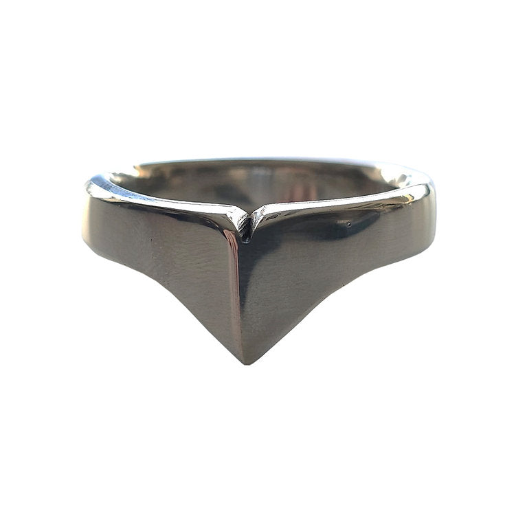 A silver-toned stainless steel ring with a pointed, crown-like design.