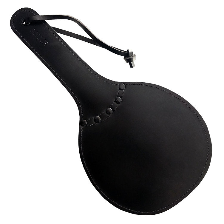 Black leather ping pong paddle with a strap and studs.