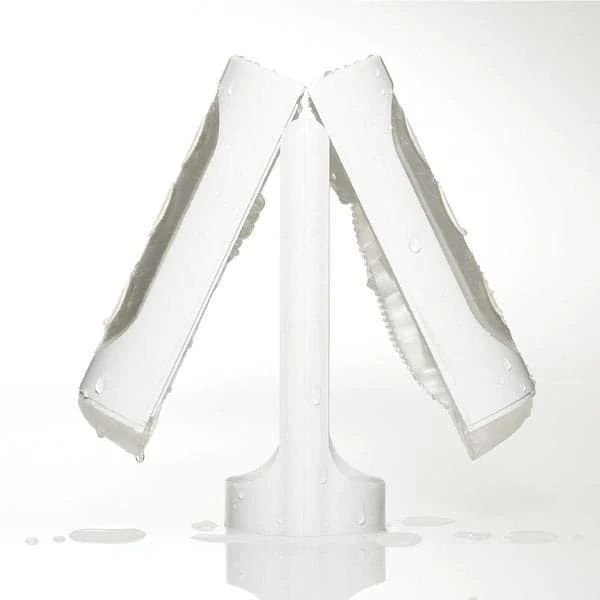 White Tenga Flip Hole reusable male masturbator with water droplets.