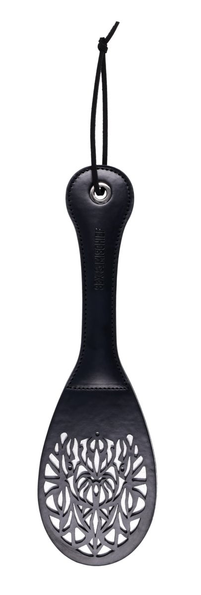 Black faux leather spanker paddle with a split tip and lace cutout.