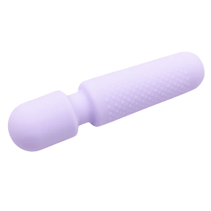 A small, purple silicone vibrator with a textured handle.