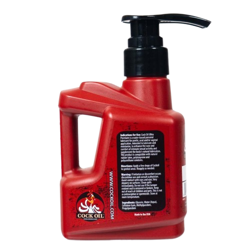 Red pump bottle of Cock Oil water-based lubricant with label.