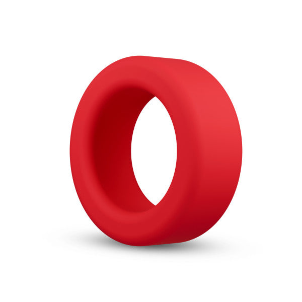 A red silicone cock ring with a smooth finish.