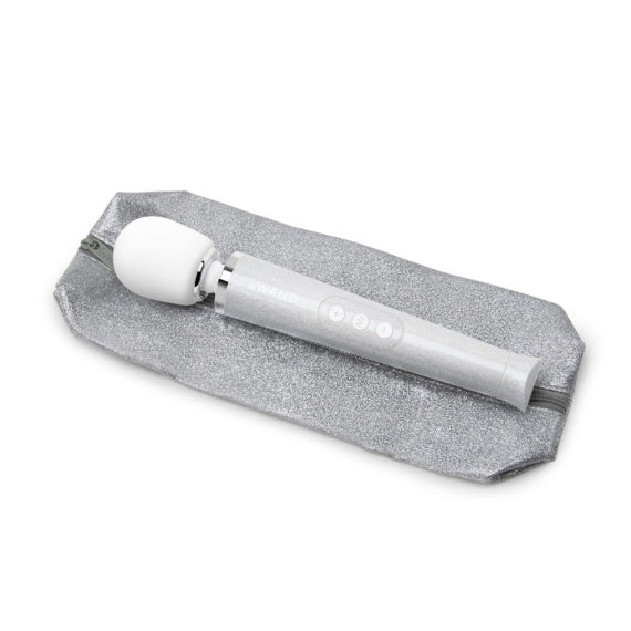 A white wand massager with a silver glitter pouch.
