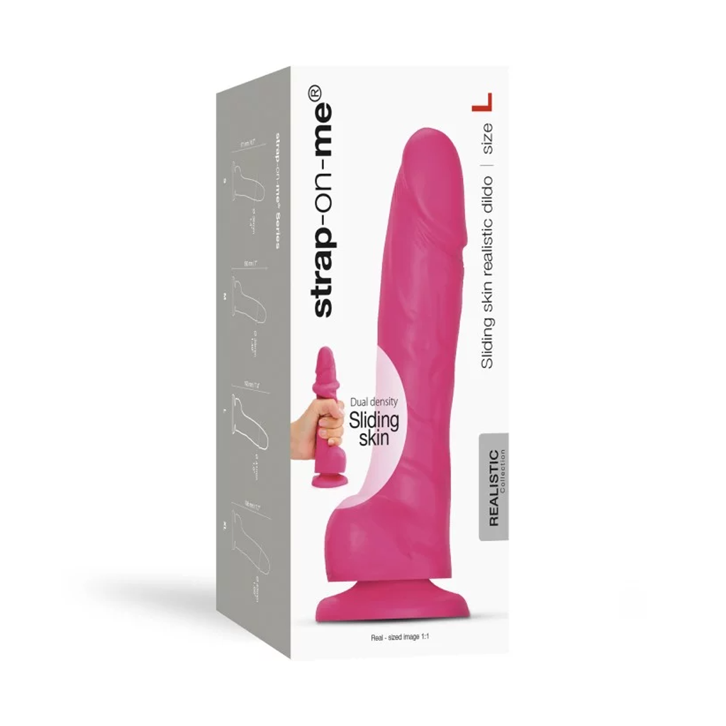 Pink strap-on dildo with realistic sliding skin silicone in large size, shown in box with hand.