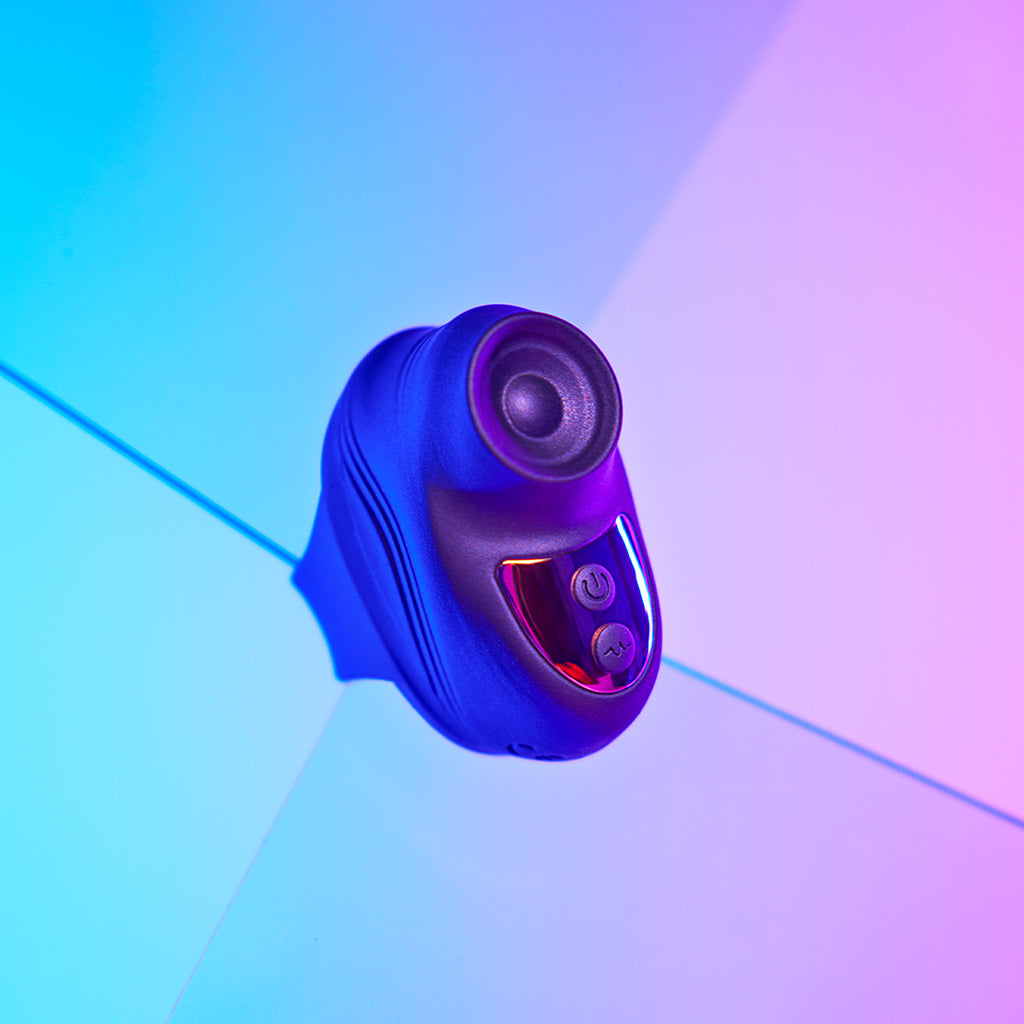 A blue silicone finger vibrator with two buttons and a textured tip.