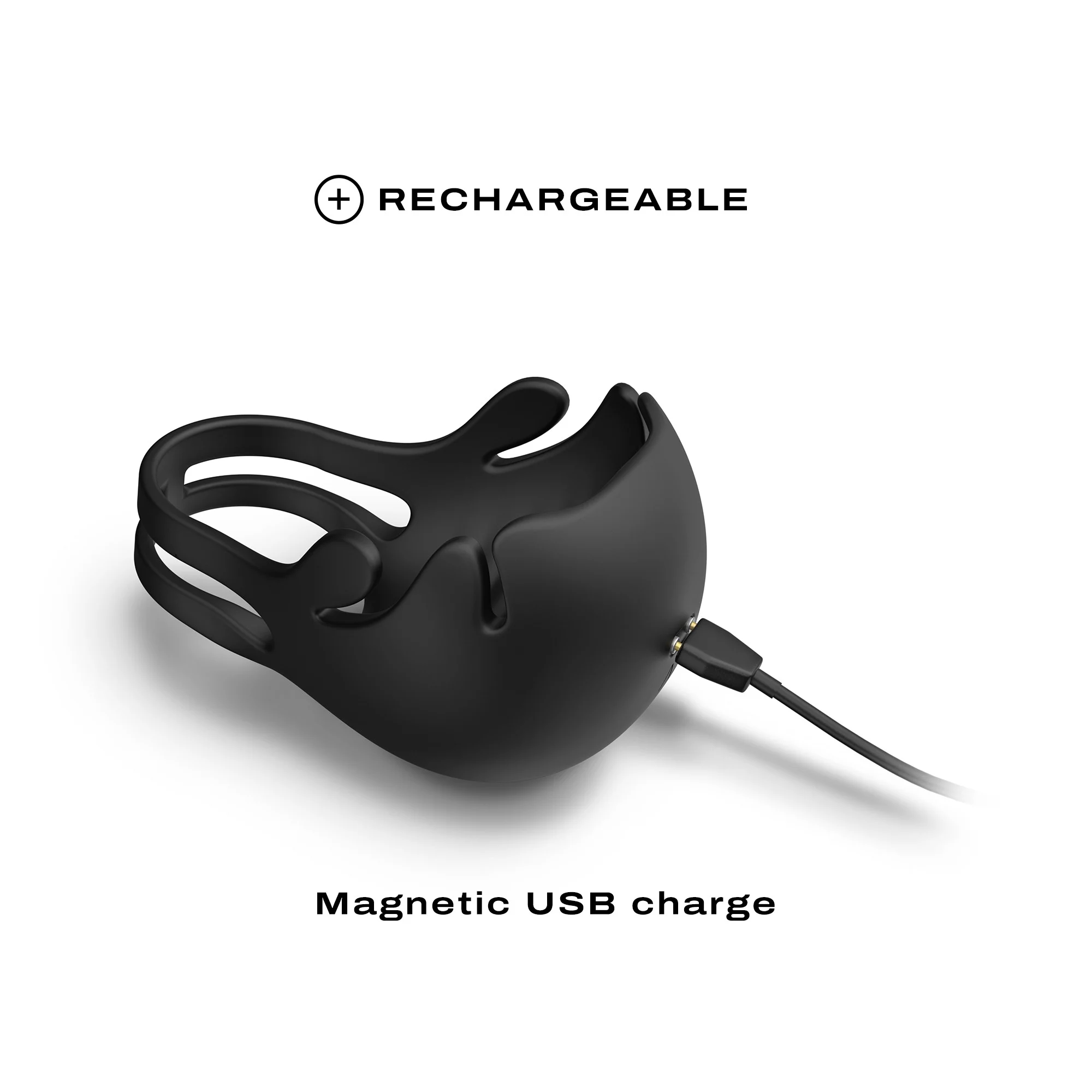 Black vibrating penis and testicle stimulator with magnetic USB charging.