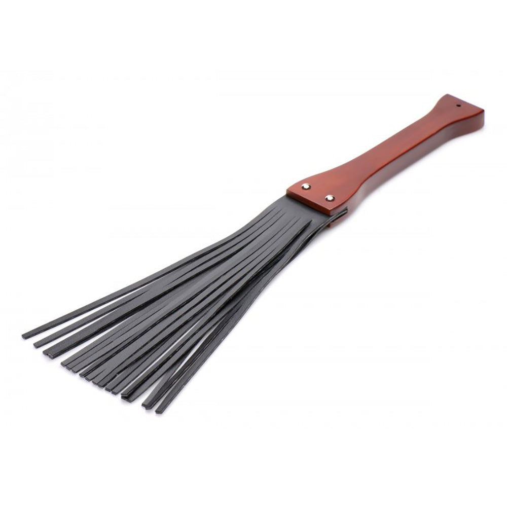 Flogger with a wooden handle and multiple black leather falls.