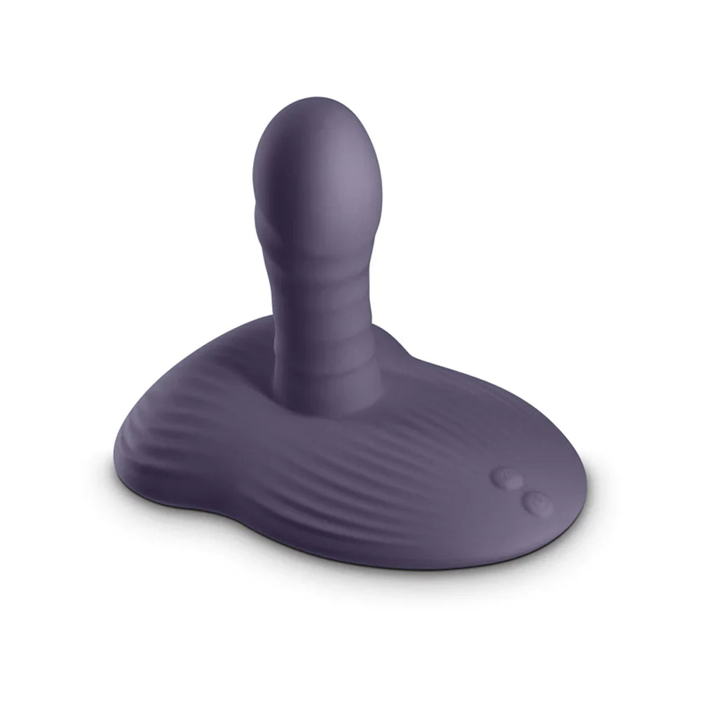 A purple app-controlled thrusting and grinding wand with a textured base.