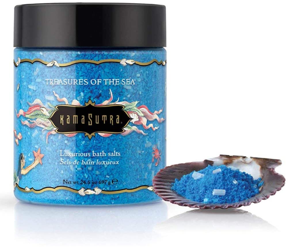 Kama Sutra Treasures of the Sea luxurious blue bath salts in a jar with a seashell scoop.
