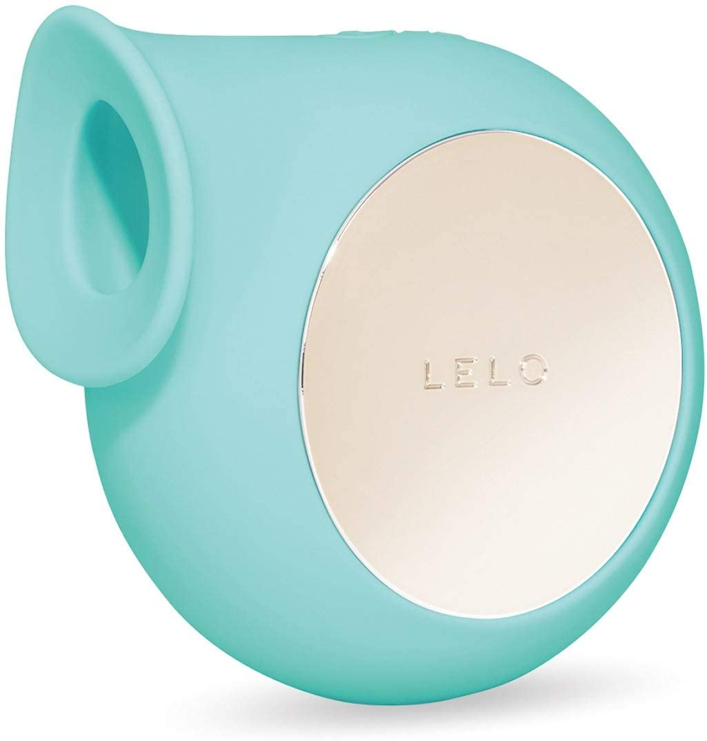 A teal clitoral massager with a gold circular panel and the LELO logo.