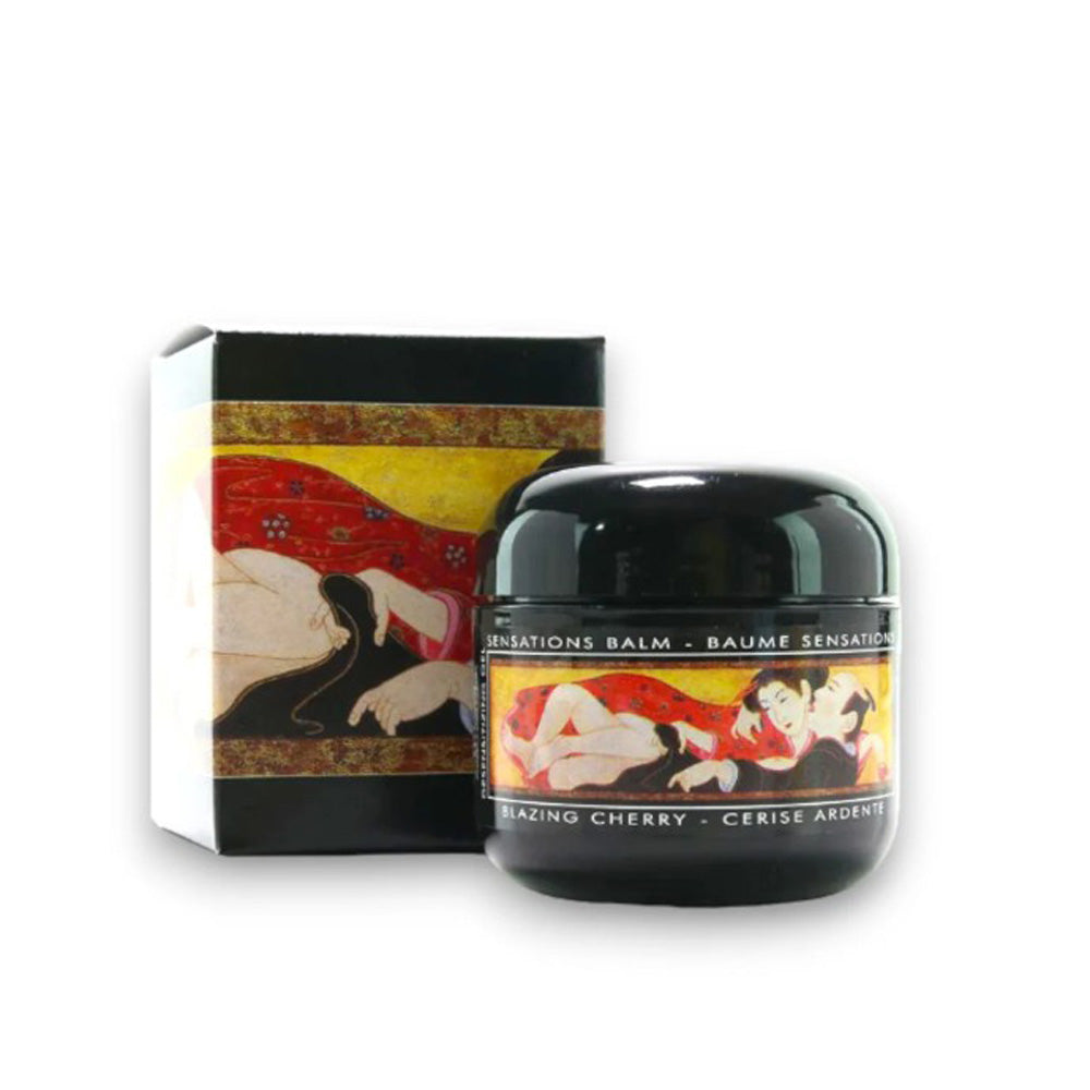 Black jar and box with erotic artwork for Shunga Desensitizing Delay Balm in Blazing Cherry.