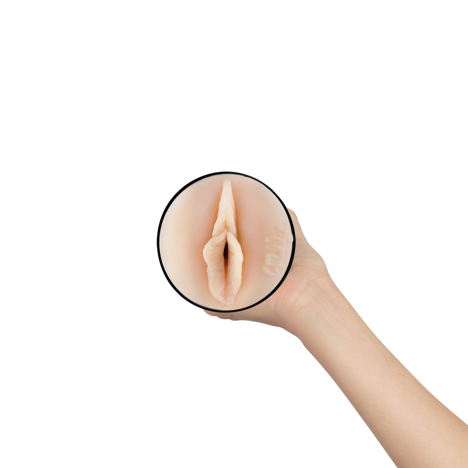 A hand holds a realistic stroker masturbator with a detailed interior.