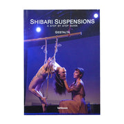 Shibari Suspensions book cover with a person suspended by ropes and another person assisting.